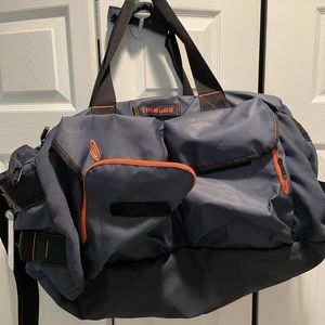 Timbuk2 travel bag side pockets and straps for backpacking